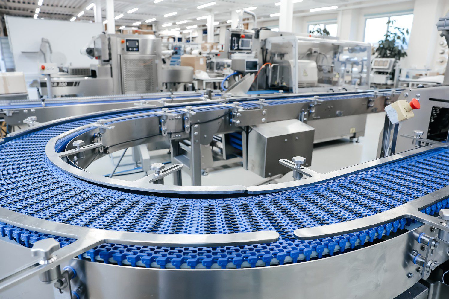 Factory conveyor belt in modern production facility.
