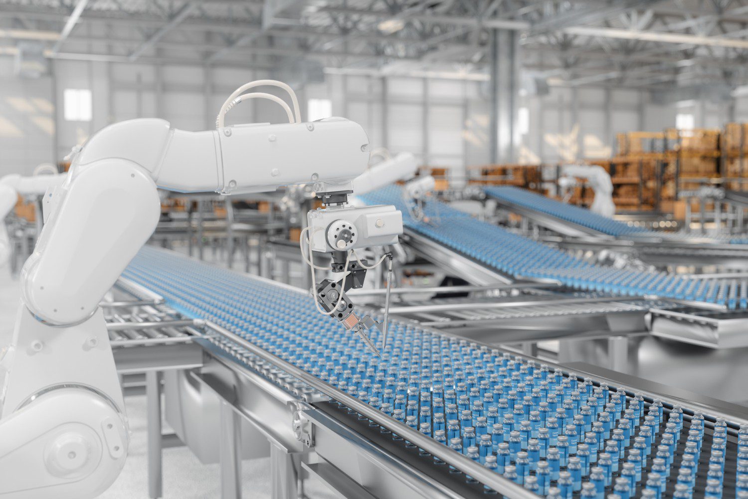 Robotic arm on automated factory conveyor belt.